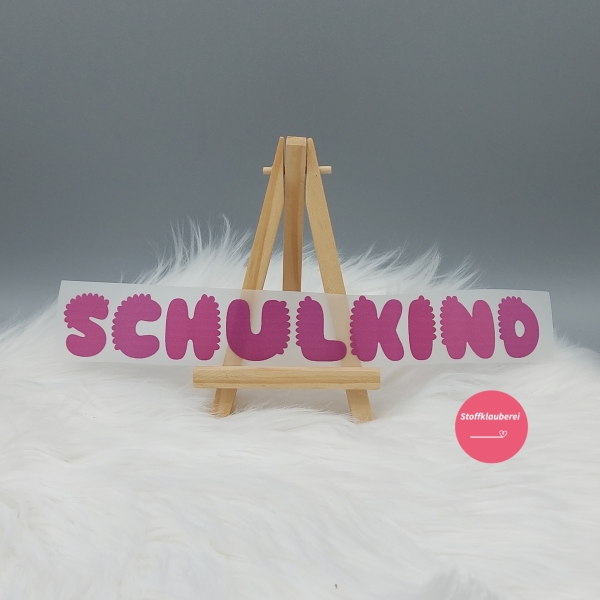 "Schulkind" dunkles rosa Bügelbild (ca. 23,5cm x 3cm)